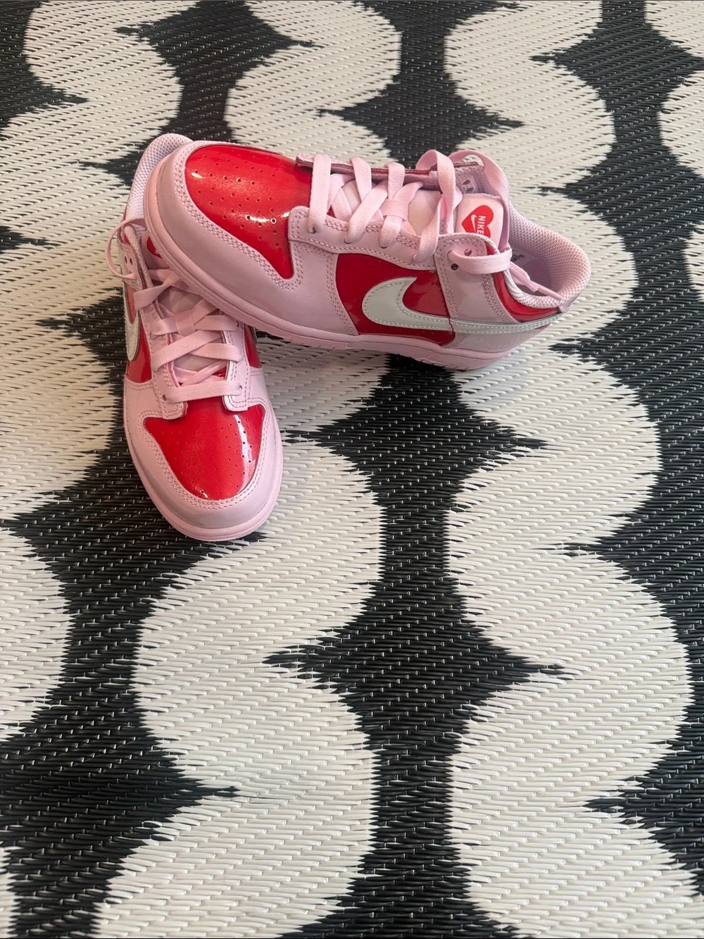 Nike Kids Pink and Red Low-Top Sneakers with White Swoosh